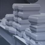 Samples of IA3D's End-Use Production: Stacks of 3D-printed boxes sit on a table